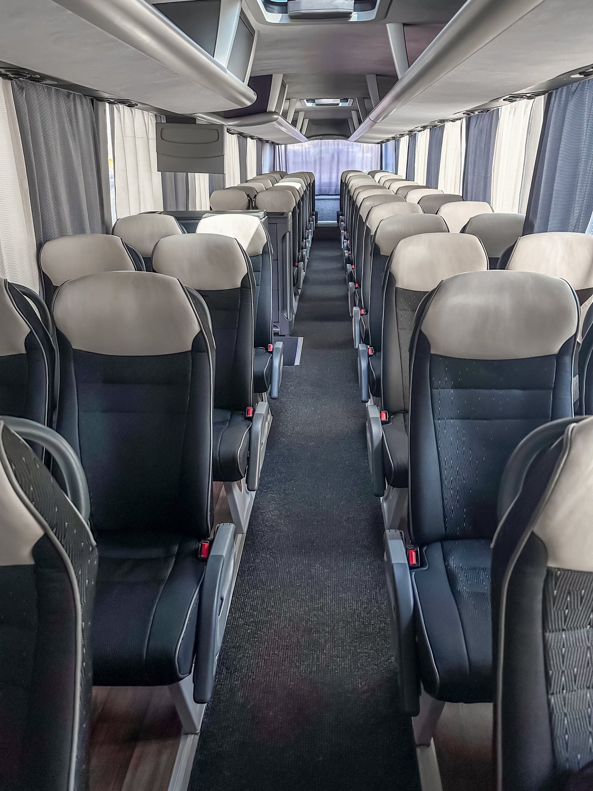 Interior of coach bus rows of seats